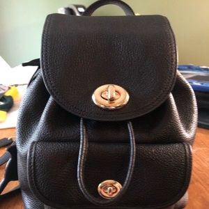 Coach mini-size leather backpack